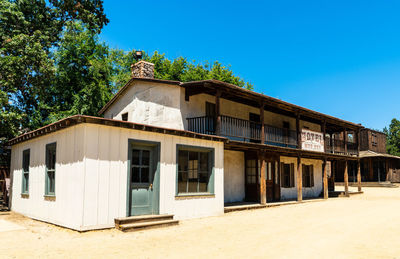Exterior of old building against clear blue sky