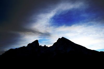 Silhouette mountains against sky