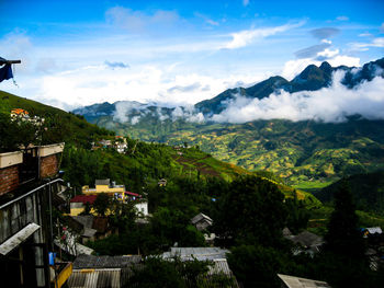 Scenic view of townscape against sky