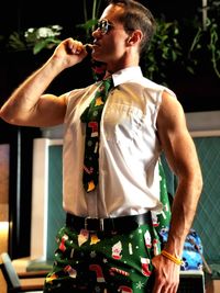 Thoughtful man standing in restaurant