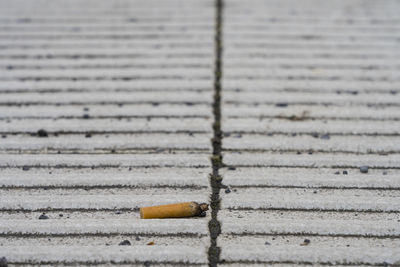High angle view of cigarette smoking on table