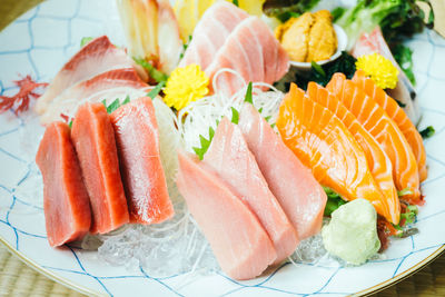 Close-up of sashimi served on table