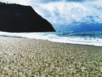 Scenic view of beach against sky