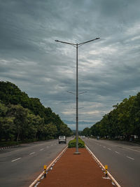 Empty road against sky