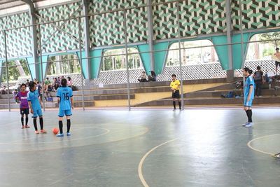 Group of people playing basketball