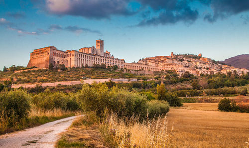 Medieval houses and cathedral against sky