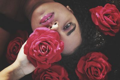 Close-up of woman holding rose bouquet