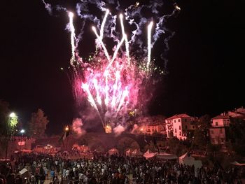 Firework display at night