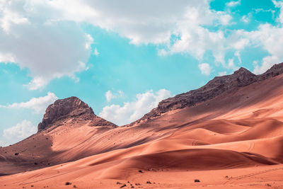 Panoramic view of desert against sky