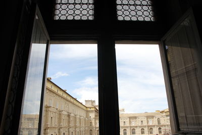 Buildings seen through window