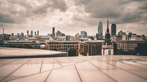 Modern buildings in city against sky