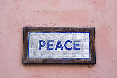 Close-up of text on wall