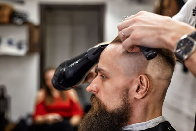 Side view of man smoking