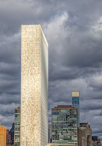Modern buildings in city against sky