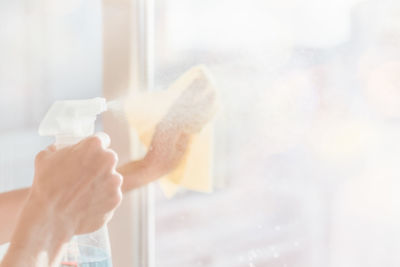 Close-up of hand holding ice cream