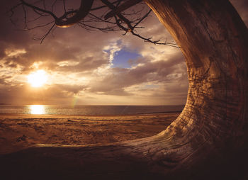 Scenic view of sea against sky at sunset