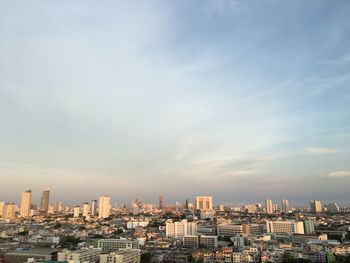 Modern buildings in city against sky