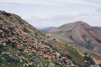 Scenic view of landscape and mountains against sky