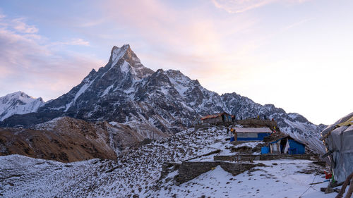 Scenic view of snowcapped mountains against sky