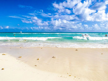 Scenic view of beach against sky