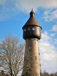 Low angle view of water tower against sky