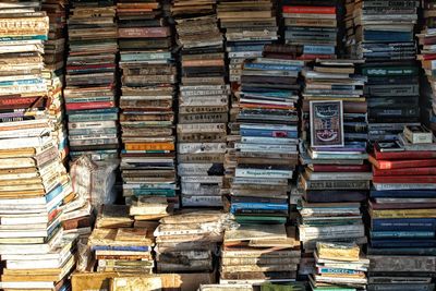 Full frame shot of stacked books for sale