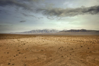 Scenic view of desert against sky