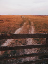 Road passing through field