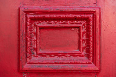 Close-up of closed red door