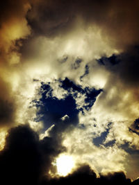 Low angle view of clouds in sky during sunset