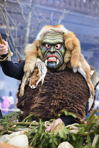 Public and traditional parade with funny masks at carnival