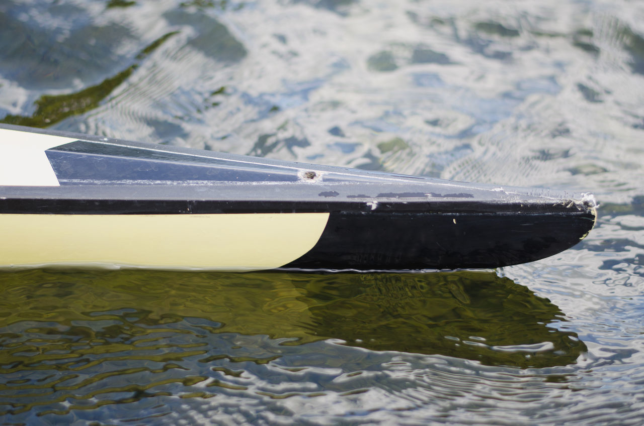 HIGH ANGLE VIEW OF BOAT FLOATING ON LAKE