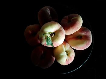 Directly above shot of apple against black background