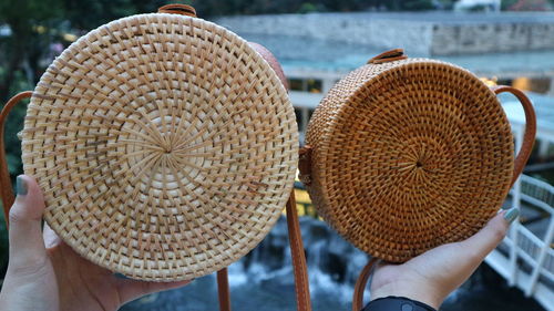 Close-up of man holding basket