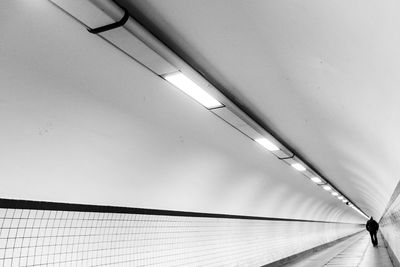 Low angle view of illuminated wall in subway