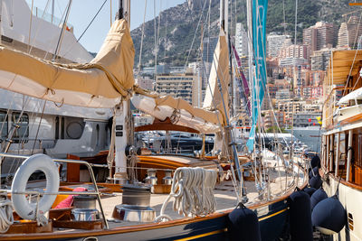 Boats moored at harbor