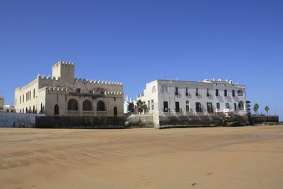 View of built structure against clear blue sky