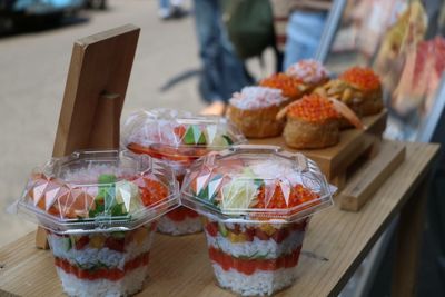 Close-up of food in box on table at shop for sale