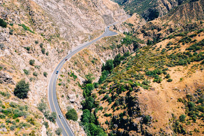 High angle view of road amidst mountains