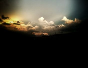 Silhouette of trees against sky at sunset