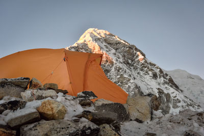 Scenic view a tent in rocky landscape 