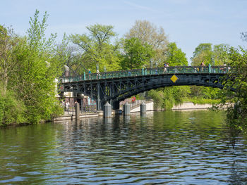 Bridge over river against sky