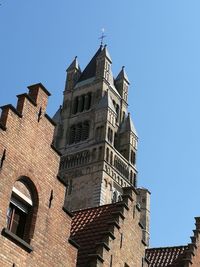 Low angle view of buildings against clear sky