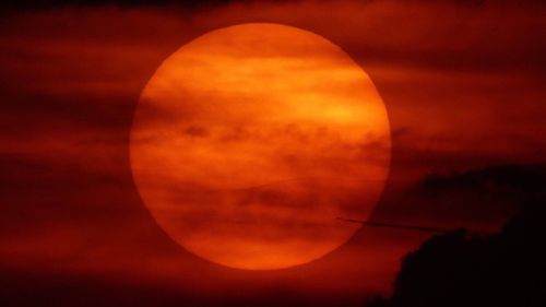 Close-up of illuminated orange sky