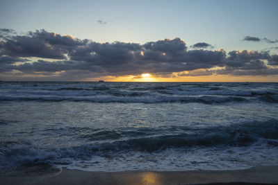 Scenic view of sea against sky during sunset