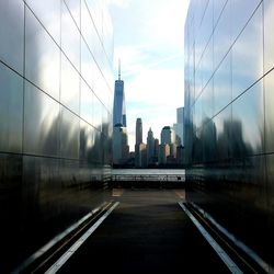 Modern buildings in city against sky