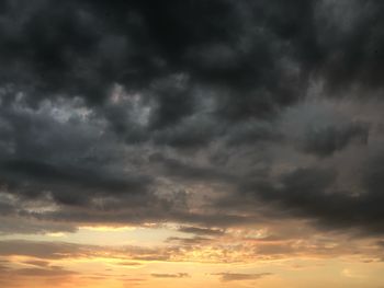 Low angle view of dramatic sky during sunset