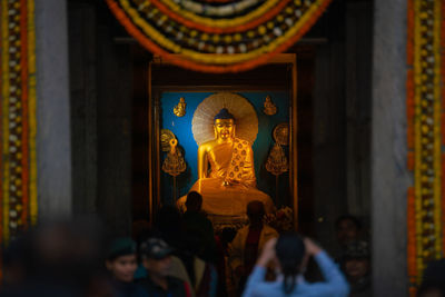 Statue in illuminated building