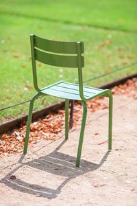 Empty bench in park