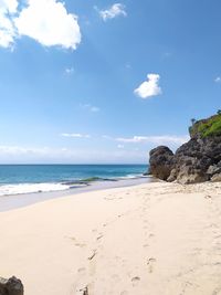 Scenic view of beach against sky